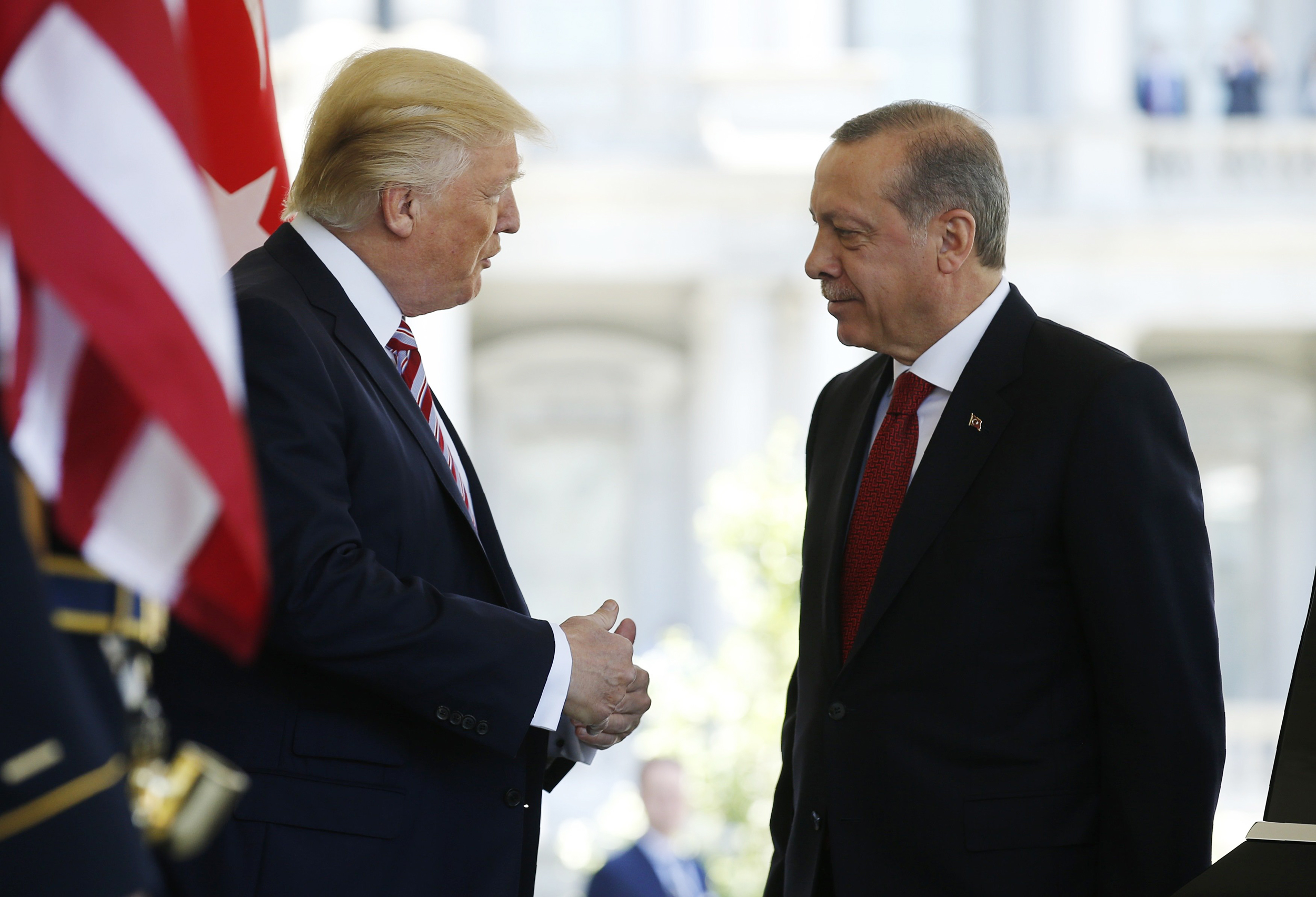 Image: President Trump talks with Turkey's President Erdogan at the entrance to the West Wing of the White House in Washington
